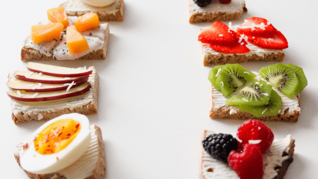 Various types of bread are arranged at the top of the table