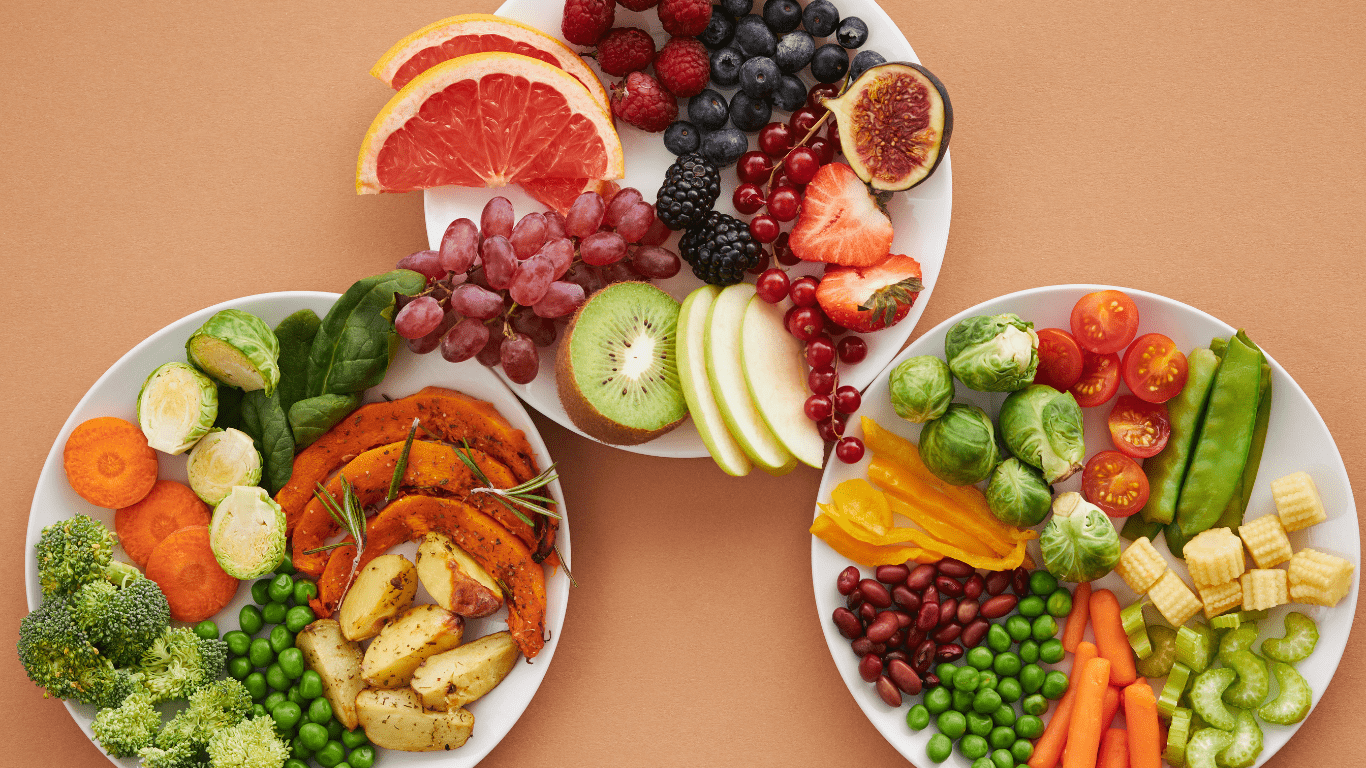 three plates with different types of fruits and vegetables