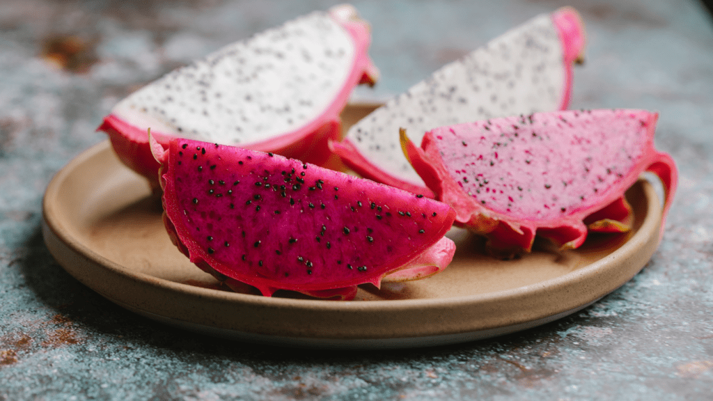 pink dragon fruit on a wooden table