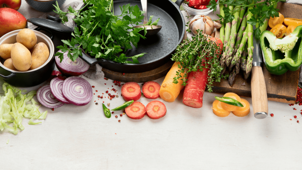 various fruits and vegetables are on a table