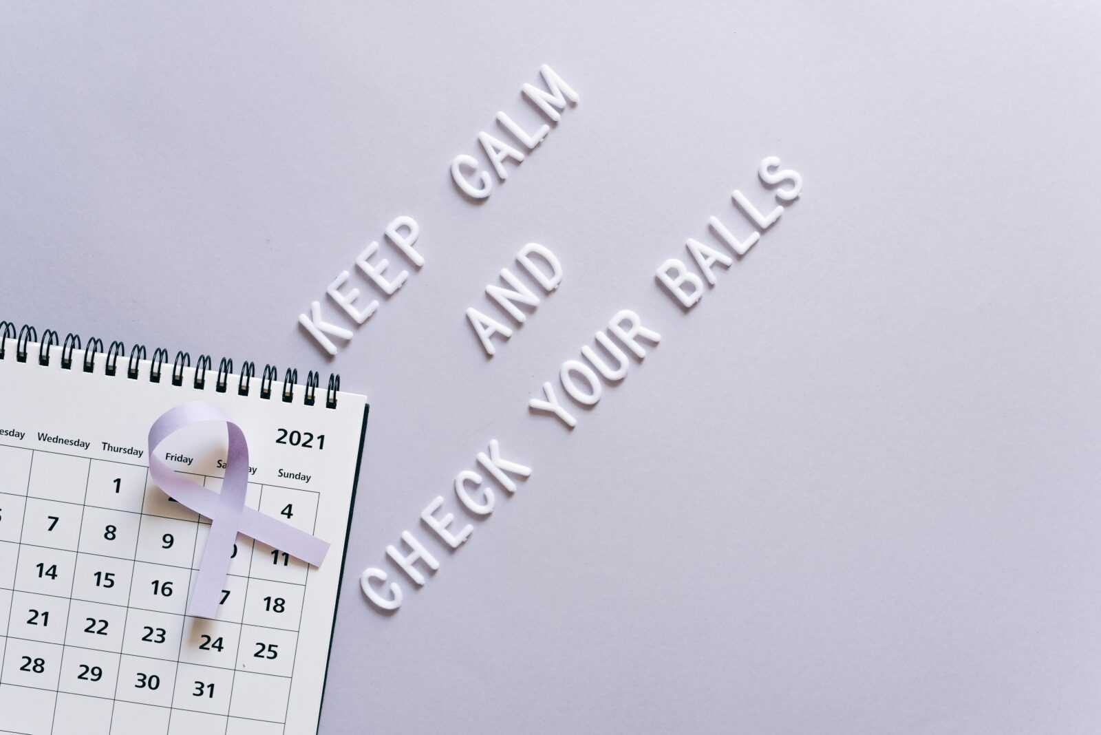 Cancer awareness concept with calendar and text reminder for self-check in minimalist style.